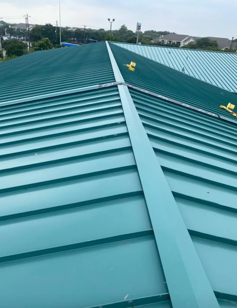 Green commercial metal roof ridge and valley for Metal Roof Repair in Cedar Grove